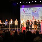 alle deelnemers op het podium