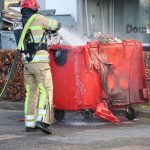 Container bij Domino's pizza vliegt in brand in Stad