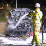 Personenauto zwaar beschadigd door brand, Frankrijkkade in Almere